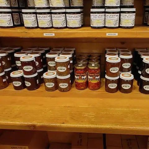 Shelves of Misty Meadows jams and hot pepper jellies